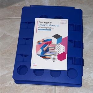NWOT BoxLegend Blue Clothes Folding Board for organizing symmetrical laundry
